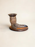 1920’s, English taxidermy ostrich foot candle stand, mounted on a wooden base