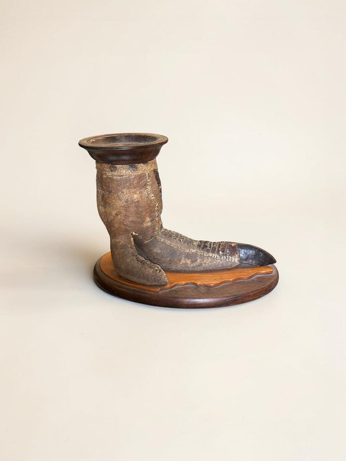 1920’s, English taxidermy ostrich foot candle stand, mounted on a wooden base