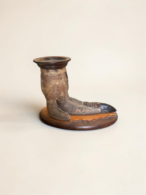 1920’s, English taxidermy ostrich foot candle stand, mounted on a wooden base