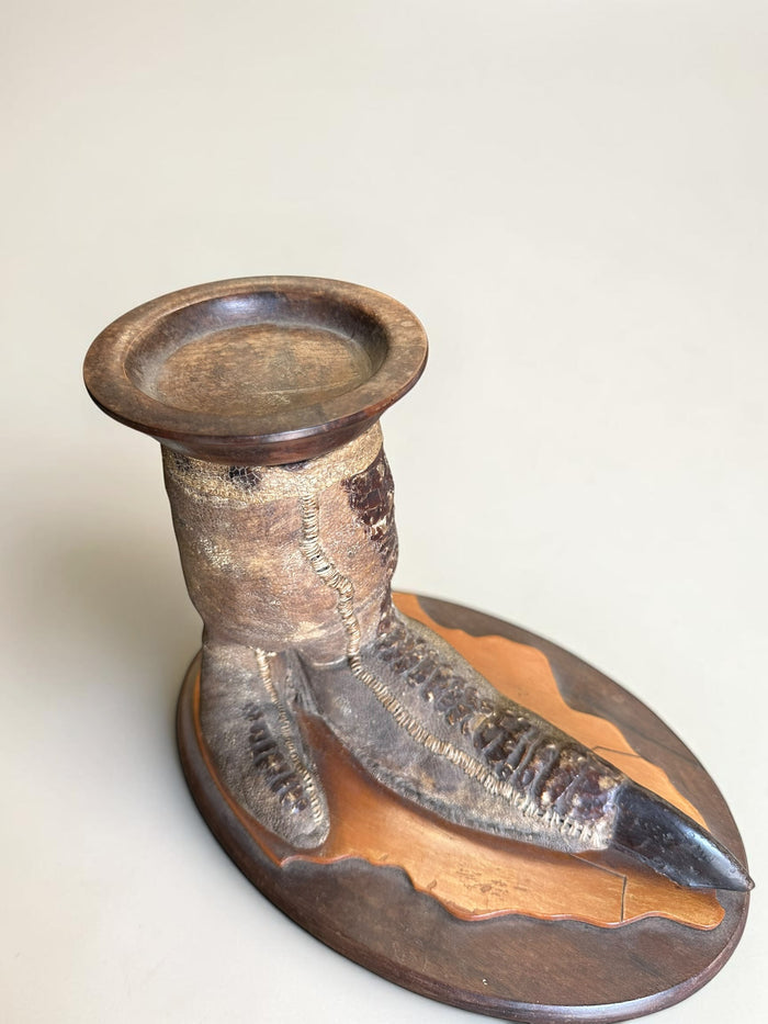 1920’s, English taxidermy ostrich foot candle stand, mounted on a wooden base