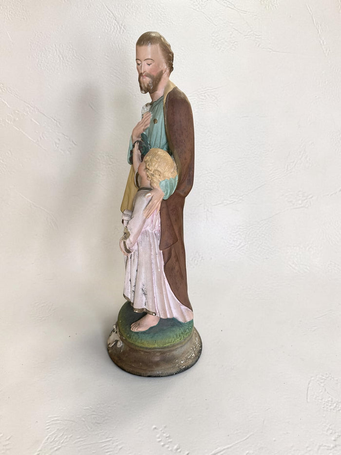 French plaster statue depicting Saint Joseph holding the Child Jesus