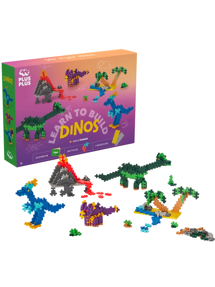 Plus-Plus Learn to Build Dinosaurs set with 600 colourful pieces and 2 building plates for creating 3D dinosaur figures like brontosaurus, triceratops, and velociraptor