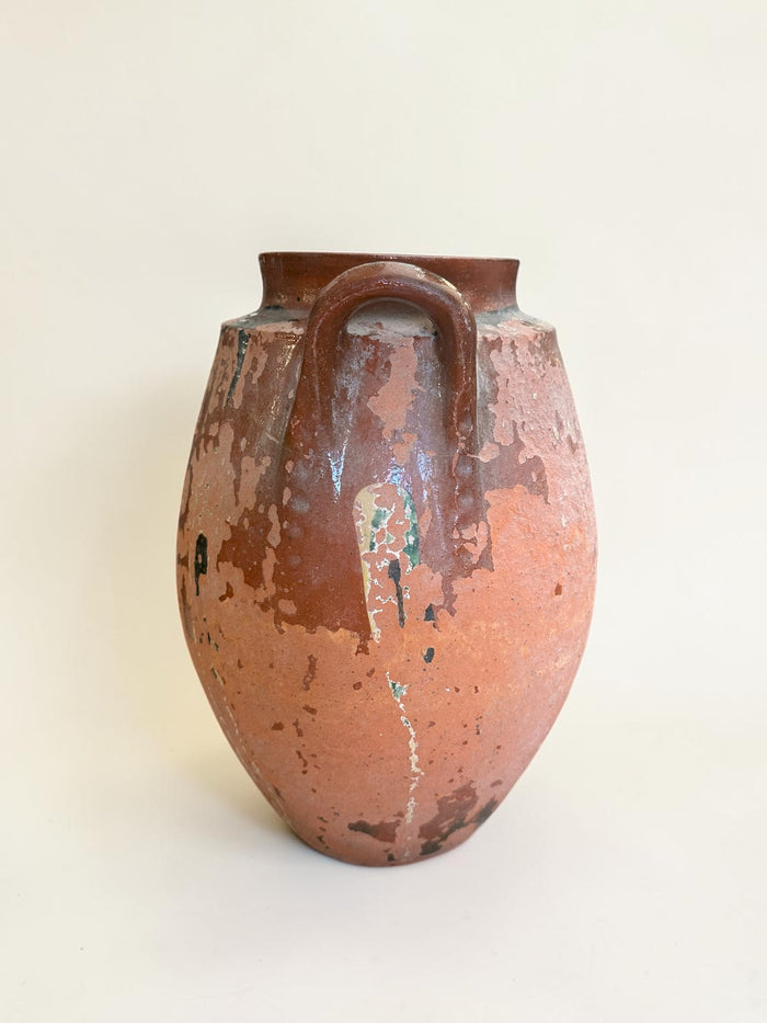 Rustic terracotta amphora jar