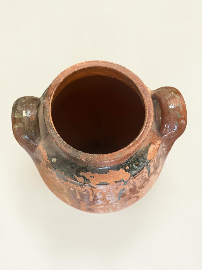 Rustic terracotta amphora jar